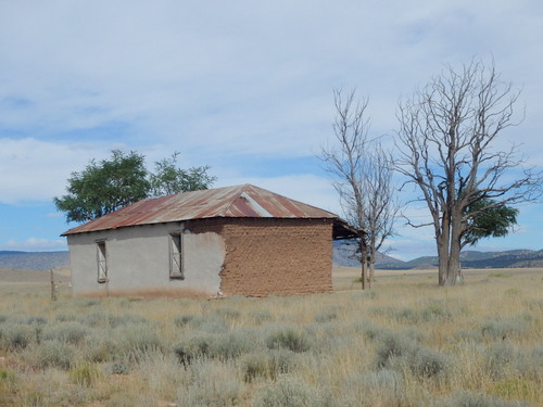GDMBR: An old adobe structure with a partial mud plaster.